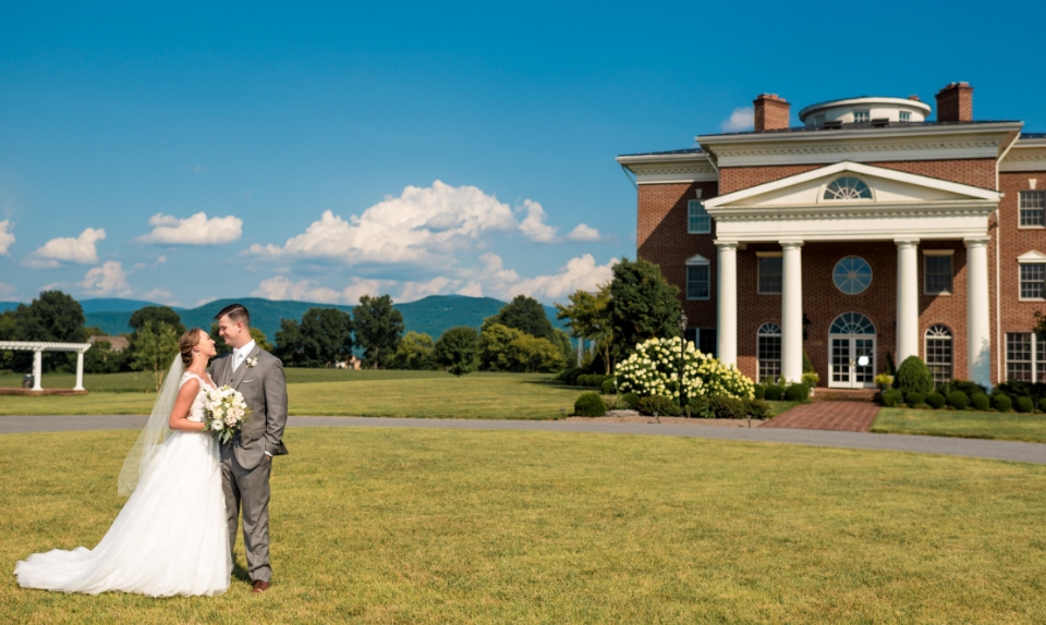 wedding couple in front of building